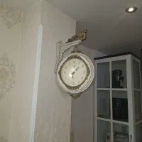 ساعت دیواری دوطرفه