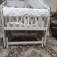 تخت گهوارهای کودک درحدنو|تخت و صندلی بچه|تهران, خاک سفید|دیوار