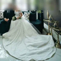 لباس عروس مزون دوز با متریال ترک دنباله دار