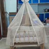 تخت خواب کنار مادر و سرویس خواب نوزاد