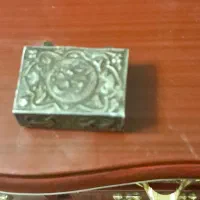 جعبه مینیاتوری وقرآن خیلی قدیمی واحتمالا جعبه‌نقره