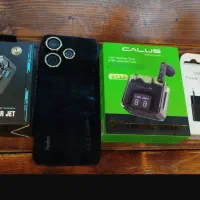 گوشی ردمی ۱۳. همراه با وسایل