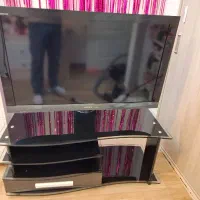 تلویزیون سونی 40 مالزی سالم به همراه میز شیشه سالم