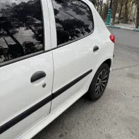 پژو ۲۰۶ تیپ 2سفید مدل 99 مناسب مصرف کننده