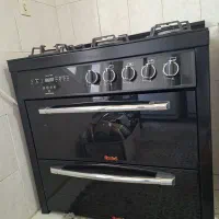 گاز ۵ شعله صفحه شیشه ای در حد نو