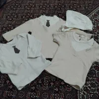 نوزادی تا ۶ ماهگی|کفش و لباس بچه|کرج, شهرک بیدارچشمه|دیوار