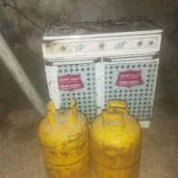 2عددکپسول گازبااجاق گاز کارکرده