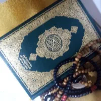 سر کتاب با قرآن