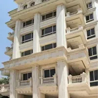 فروش آپارتمان ۹۰ متری دو‌خوابه خوش نقشه بدون‌پرتی