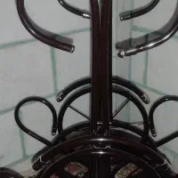 یک عدد میز تلفن فلزی قدیمی