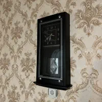 ساعت دیواری مشکی