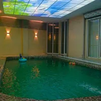 استخر آبگرم با عمارتی دل باز|اجارهٔ کوتاه‌مدت ویلا و باغ|رشت, بلوار گیلان|دیوار