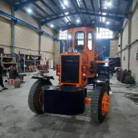 تراکتور رومانی بیل عقب لودریموتور وگیربکس