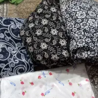 تعدادی پارچه چادر و زیرپوش مردانه