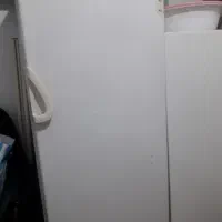 وسایل خانگی یخچال و فریزر و میز تلویزیون