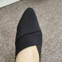 تعدادی کفش|کیف، کفش، کمربند|رشت, فلسطین|دیوار