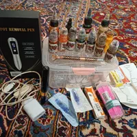 وسایل تاتو تعدادی رنگ تاتو وبهمراه دستگاه تاتو