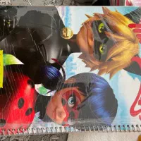 دفتر مشق حاشیه دار خانه الفبا دختر کفشدوزکی