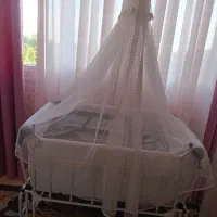 گهواره کنار مادر (برقی)