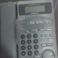 گوشی تلفن ومیز تلفن هردو سالم