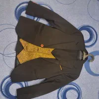 کت و شلوار بچگانه۷تا ۹ساله ،جلیقه دورو شتری مشکی
