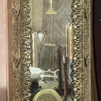 ساعت برنزی ایستاده