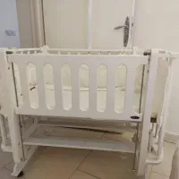 گهواره چوبی سفید رنگ ننو