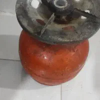 پیک نیک بوتان صحیح و سالم با سری پر گاز داخلش