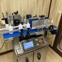 لیبل چسبان صنعتی اتومات ظروف گرد و تخت