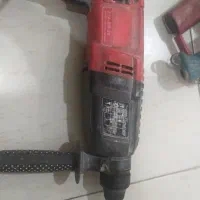 زیر پا و خرک  ویک عدد دریلر تعمیری بتن