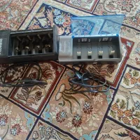 دو عدد شارژ کن باطری های قلمی و کتابی 9 ولت