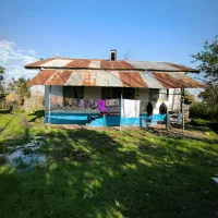 خانه قدیمی قابل سکونت 1050متر جاده زیباکنار/کد876