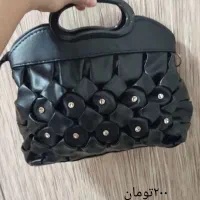 لباس و کیف|لباس|آستانه اشرفیه, |دیوار
