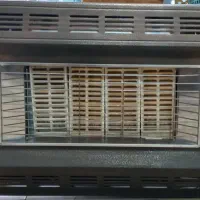 بخاری گازی دیواری طرح شومینه ای