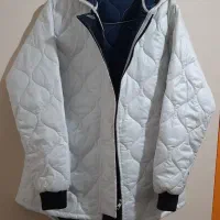 کاپشن|لباس|آفتاب, |دیوار