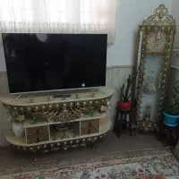 میزتلوزیون وساعت برنز
