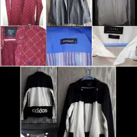 تعدادی پیراهن و گرمکن مردانه پسرانه