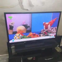 تلویزیزیون52اینچ سامسونگ ومیز تلویزیون