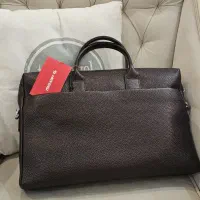 تعدادی کیک چرم و کیف پول