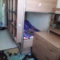 تخت خواب نوجوان دو طبقه دارای کتابخانه میز تحریر