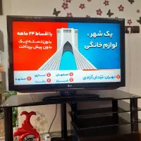 تلویزیون ال جی اصل و زیرتلویزیون شیشه ای سالم