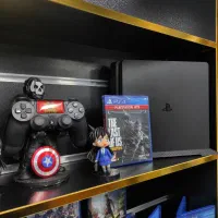 ps4 slim  دو دسته درحد نو کم کارکرد