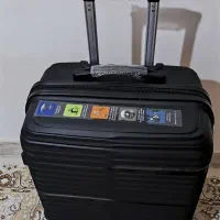 چمدان مسافرتی آکبند|کیف، کفش، کمربند|رشت, منظریه|دیوار