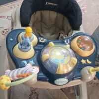 روروئک به همراه شکم بند نوزاد