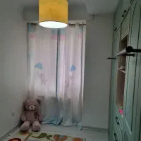 پرده و لوستر اتاق کودک