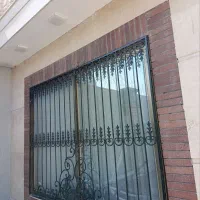 تولید اکاردیونی و درب کشوی پنجره حفاظ روی دیوار