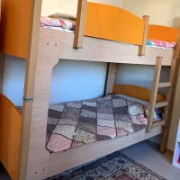 تخت خواب دو طبقه، میز تحریر ،دراور با کتابخانه