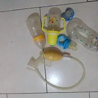 شیر دوش دستی به همراه سه شیشه شیر و دو پستونک|اسباب و اثاث بچه|ری, حمزهآباد|دیوار