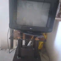 تلویزیون سالم ۲۱ اینچ همراه با میز