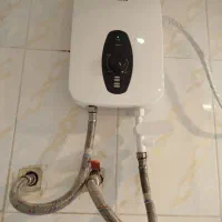 ابگرمکن دیواری برقی بدونه مخزن ودوعدد روشویی